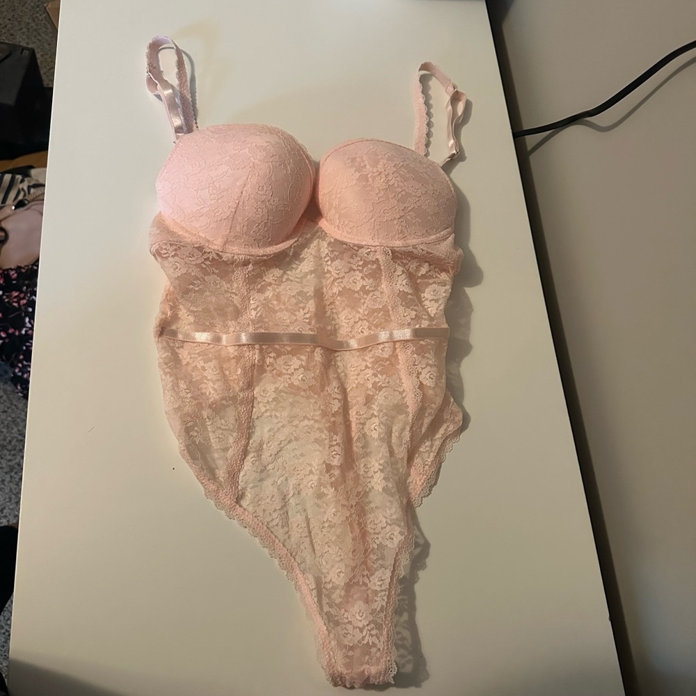Elegant Pink Lace Bodysuit
